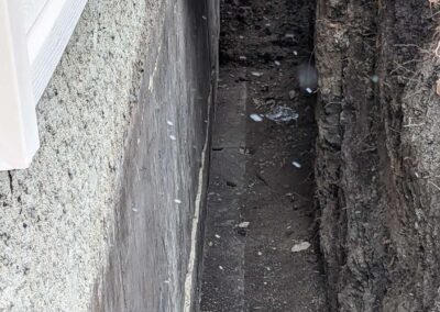 Dry basement interior after waterproofing contractors completed repairs