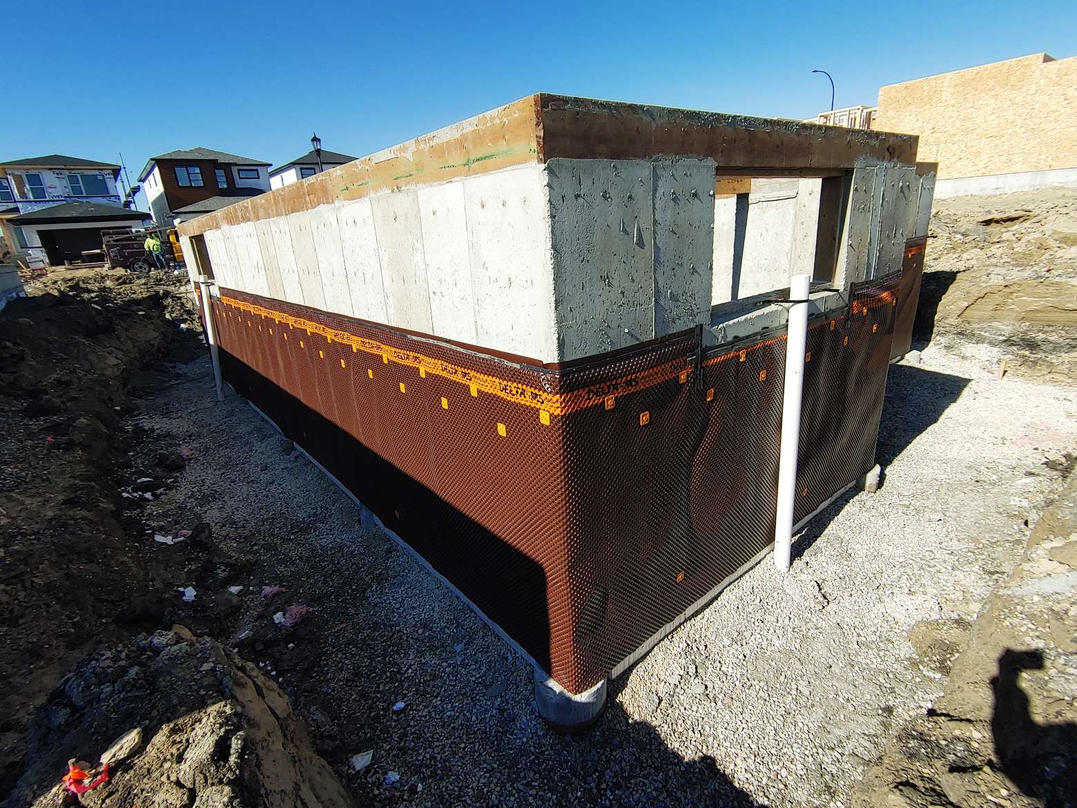 Foundation repair experts fixing cracked structural walls in Oak Bluff, MB.